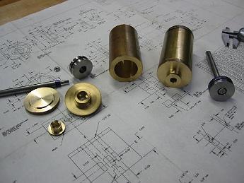  September and October 2002 were all about lathe work, brass and stainless steel.  Here are the cylinder assemblies, two each.  The stainless steel work was on the pistons and rods.  The cylinders were bored out to 1.375